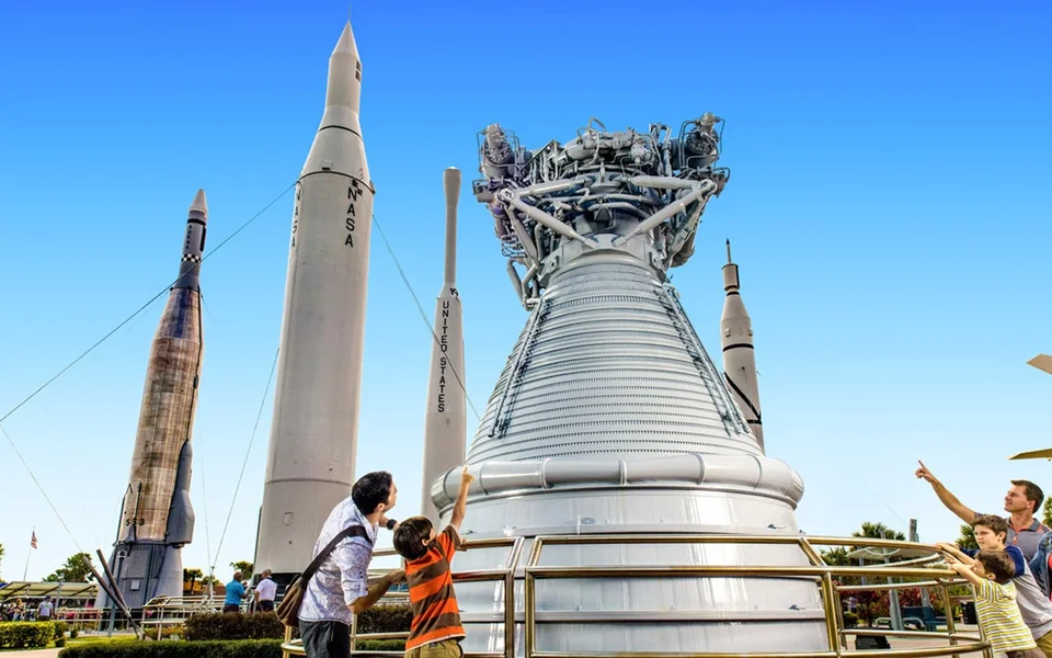 Rocket engines and spacecraft displayed outdoors at Kennedy Space Center