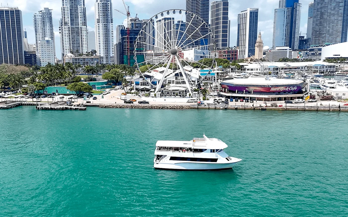 White sightseeing boat on Biscayne Bay in front of the Miami waterfront